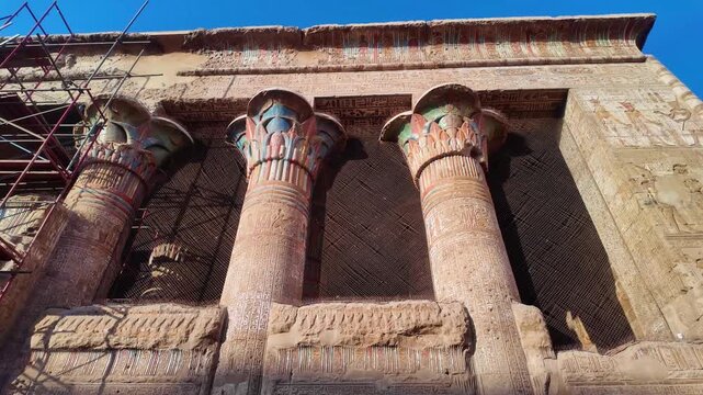 Ancient egyptian architecture in esna with detailed columns and carved hieroglyphs. The ptolemaic building is dedicated to the god khnum