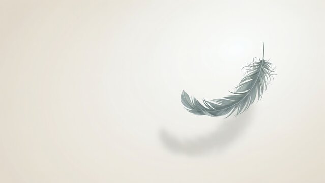 A single gray feather floating in mid-air with a soft shadow on a light beige background.