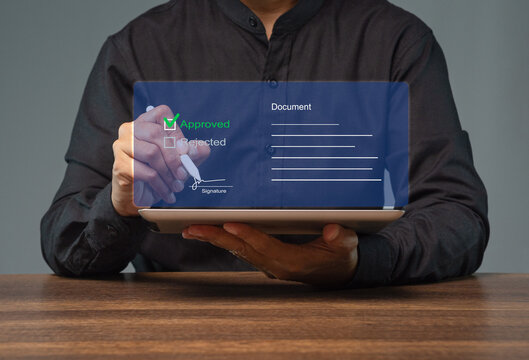 Person Approving Digital Document with Electronic Signature