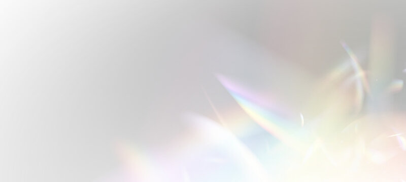 Soft rainbow bokeh lights float on a transparent background. Crystal reflections create a dreamy atmosphere. PNG overlay element for creative editing.
