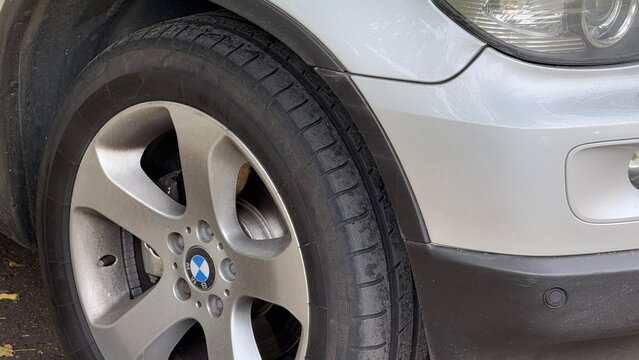 BMW X5 E53 first generation luxury SUV showing front wheel, body details and classic German automotive design