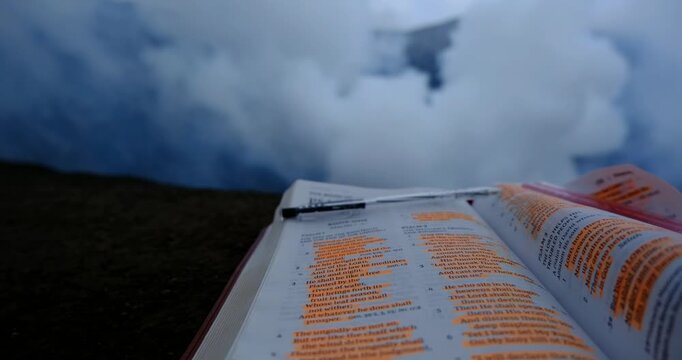 Open Bible on Active Volcano at Mount Bromo, Indonesia