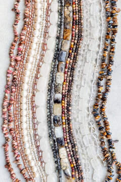 Lots of gemstones and pearls beads for jewelry, top view