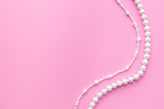 Natural white pearls - beads for jewelry, top view. Precious and elegance concept background