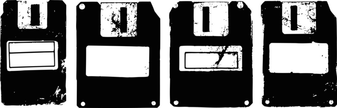 Vintage floppy disks in a row old computer storage media for data and software backup