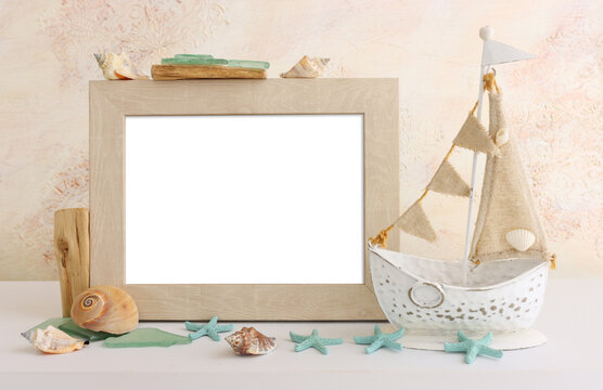 summer background with boat, blue sea glass and shells