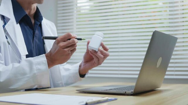 Doctor explaining treatment and medication instructions to a patient online through a laptop during a telehealth consultation, representing digital healthcare, prescription guidance, remote medical ad