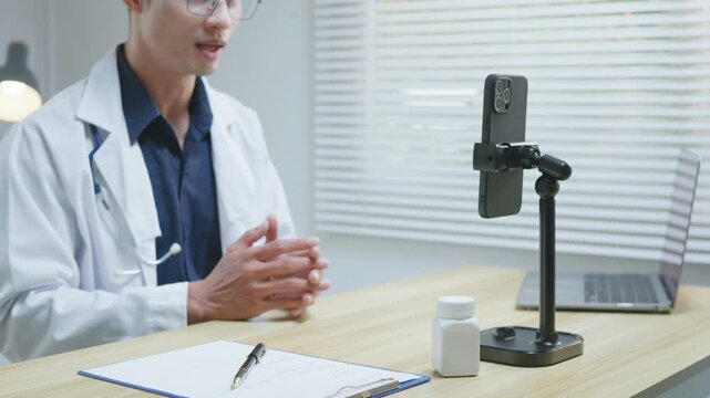 Doctor explaining treatment and medication instructions to a patient online through a smartphone during a telehealth consultation, representing remote healthcare, digital medical advice, prescription 