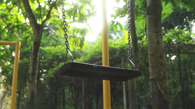 The swings in the park during the day
