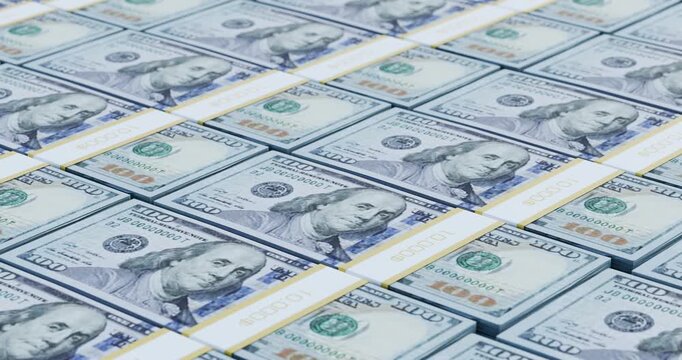 3D animation moving across stacks of hundred dollar bills