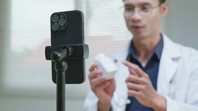 Doctor explaining treatment and medication instructions to a patient online through a smartphone during a telehealth consultation, representing remote healthcare, digital medical advice, prescription 