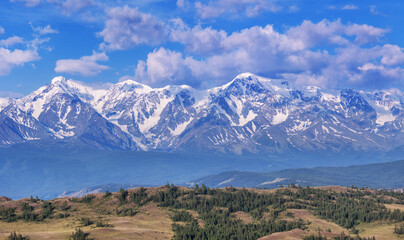 Mountain view, snow-capped mountain peaks, sunny day, summer travels © Valerii