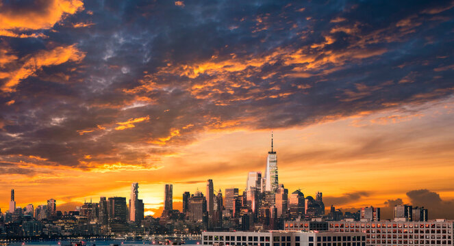 Lower Manhattan Skyline and One World Trade Center at Dramatic Sunset