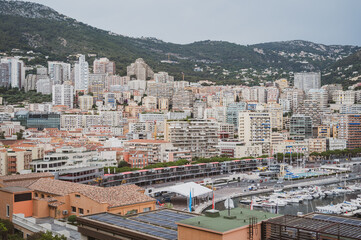 Obraz premium High angle view of Port Hercules filled with luxury yachts and superyachts in Monaco