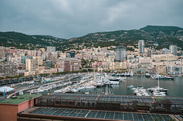 Obraz premium High angle view of Port Hercules filled with luxury yachts and superyachts in Monaco