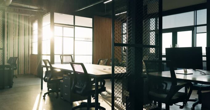 Office, equipment and chairs with empty space for company startup or business operations. Technology, computer or lens flare in workplace for career development or job opportunity in work building