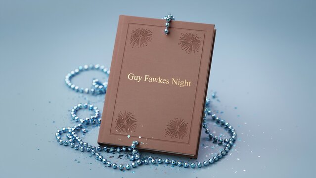 Elegant decorative brown booklet with fireworks design and guy fawkes night text surrounded by blue beads celebration concept
