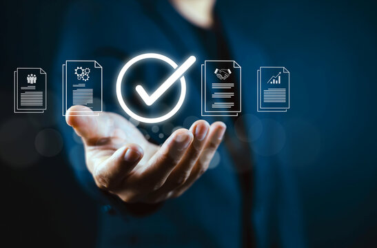 Business professional approving digital documents with a virtual checkmark, symbolizing document verification, compliance, quality assurance, contract approval, workflow automation business efficiency