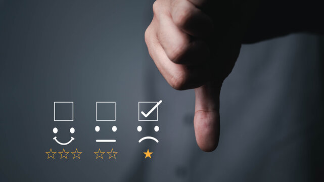 Customer dissatisfaction and negative feedback concept with low rating review and thumbs down gesture. Business evaluation, poor service experience, client complaint and quality assessment idea.