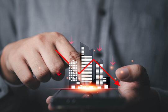 Real estate market decline concept with financial downturn graph, property investment crisis, urban economy recession, housing market loss and business risk analysis on digital mobile interface.