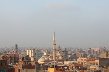 Obraz premium Aerial View of Cairo's Dense Urban Cityscape Under Haze