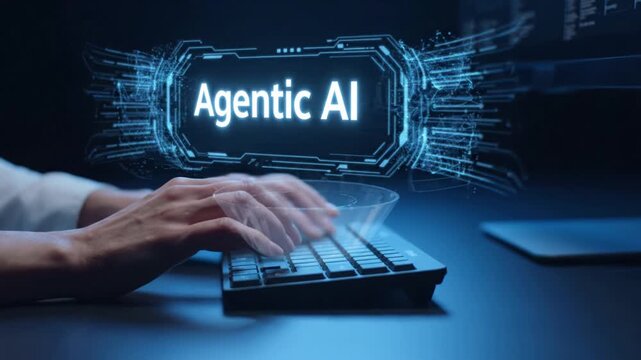 Close up of hands typing on a keyboard with a glowing blue digital interface and holographic text visualization of agentic artificial intelligence concept with copy space