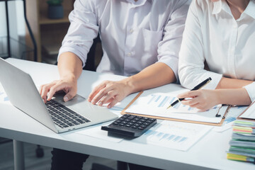Fototapeta premium economic concepts Business and partner plan data analysis to determine the direction of the company's business investment in the workplace. Night Marketing Consultant Concept 