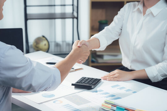 economic concepts Business and partner plan data analysis to determine the direction of the company's business investment in the workplace. Night Marketing Consultant Concept