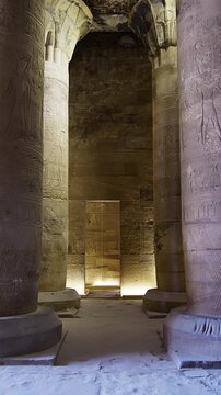 Temple of Edfu with massive carved columns and detailed hieroglyphs, revealing the atmosphere of Ancient Egyptian architecture and sacred space. Egypt
