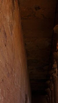 Temple of Edfu with massive carved columns and detailed hieroglyphs, revealing the atmosphere of Ancient Egyptian architecture and sacred space. Egypt