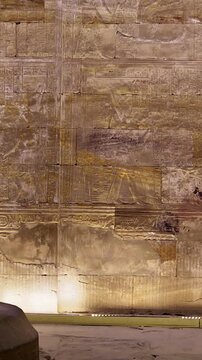 Temple of Edfu with massive carved columns and detailed hieroglyphs, revealing the atmosphere of Ancient Egyptian architecture and sacred space. Egypt