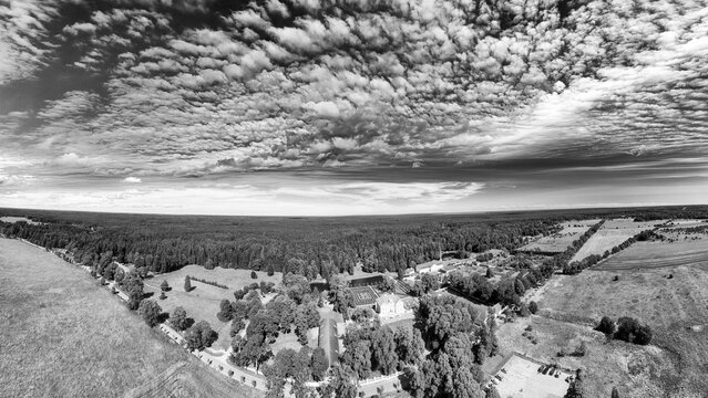 Overhead drone view of Palmse Manor and surrounding green park.