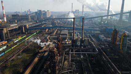 Obraz premium Factory, industrial enterprise, metallurgical plant, smoke from chimneys, aerial photography from a drone.