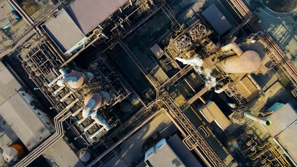 Fototapeta premium Factory, industrial enterprise, metallurgical plant, smoke from chimneys, aerial photography from a drone.