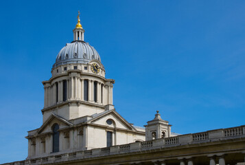 Obraz premium London UK - May 23, 2009: Classical dome and clock tower of the Old Royal Naval College in Greenwich London.