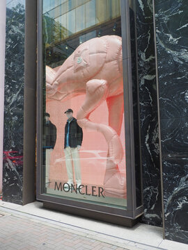TOKYO, JAPAN - June 30, 2026: Window display of a Moncler store in Tokyo's Ginza area.