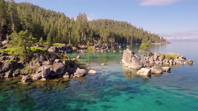 Lake Tahoe - Aerial Approach Through Rock Formations on East Shore with Crystal Clear Waters on Summer Morning 