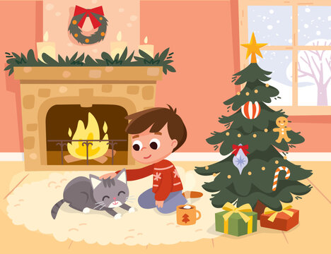 Little boy next to Christmas tree with hot chocolate petting cat. Behind the windows winter and snowfall. Fire is burning in fireplace with Xmas decoration. Christmas presents gifts under Xmas  tree