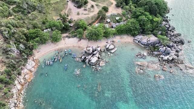 Cinematic Drone Footage of Turun Aban Beach Bangka Revealing Turquoise Sea, Rocky Coastline, Hidden Cove and Peaceful Tropical Island Landscape