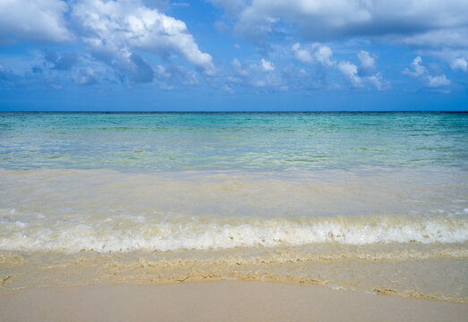 Sand beach with turquoise sea on caribbean island
