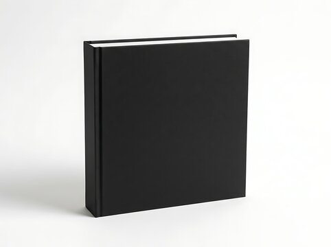 A blank black square hardcover book standing upright for product design presentation and branding mock. book mockup psd