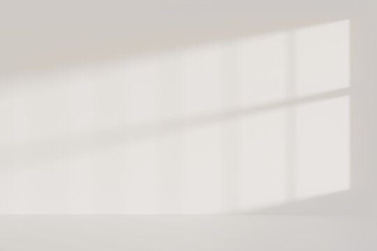 Minimalist empty room background with window shadow overlay on a beige wall, soft sunlight on a concrete floor template with copy space for product presentation. 3d render