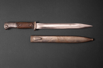 Fototapeta premium Vintage Military Bayonet with Metal Scabbard