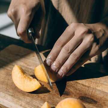 Slicing Fresh Fruit Close-up"