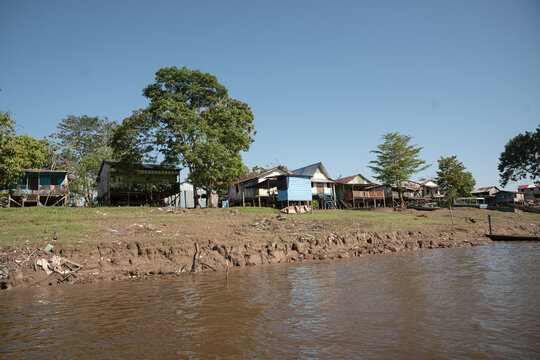  streets and wooden houses on the banks of the Amazon River.