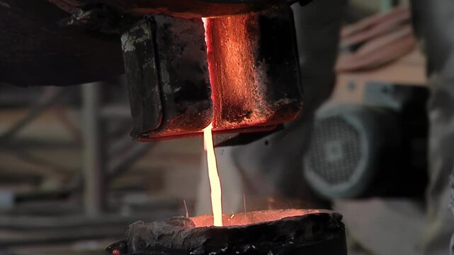 Pouring Molten Metal For Casting Process In Historic Church Bell Workshop - 4K