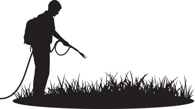 Silhouette of a person spraying grass with a backpack sprayer