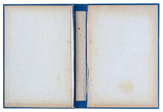 Torn open vintage hardcover book binding with blank endpapers, exposed spine and blue cloth edges isolated on white