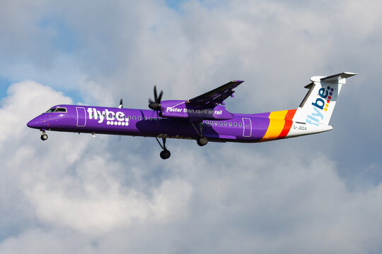 Flybe Bombardier Dash 8 Q400 (G-JEDV) on landing approach at Amsterdam Schiphol Airport on August 14, 2014 in Amsterdam, Netherlands