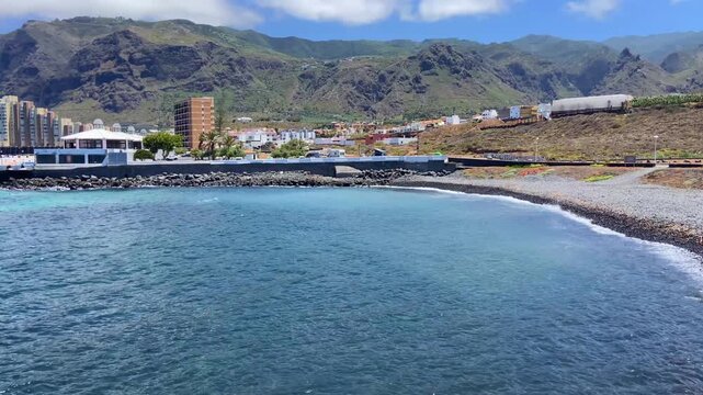 View of Puertito de Los Silos volcanic coastline with natural ocean pool the Charco de la Ara&ntilde;a, Tenerife, Canary Islands, Spain,4K. 